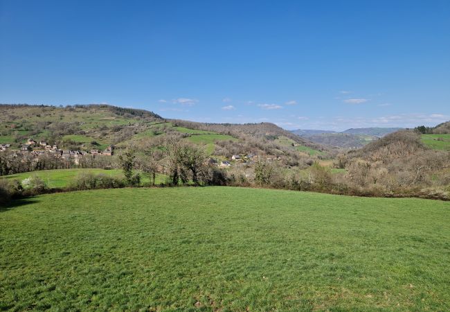 Gîte Rural à Sébrazac - L'Oustal de la Rusque