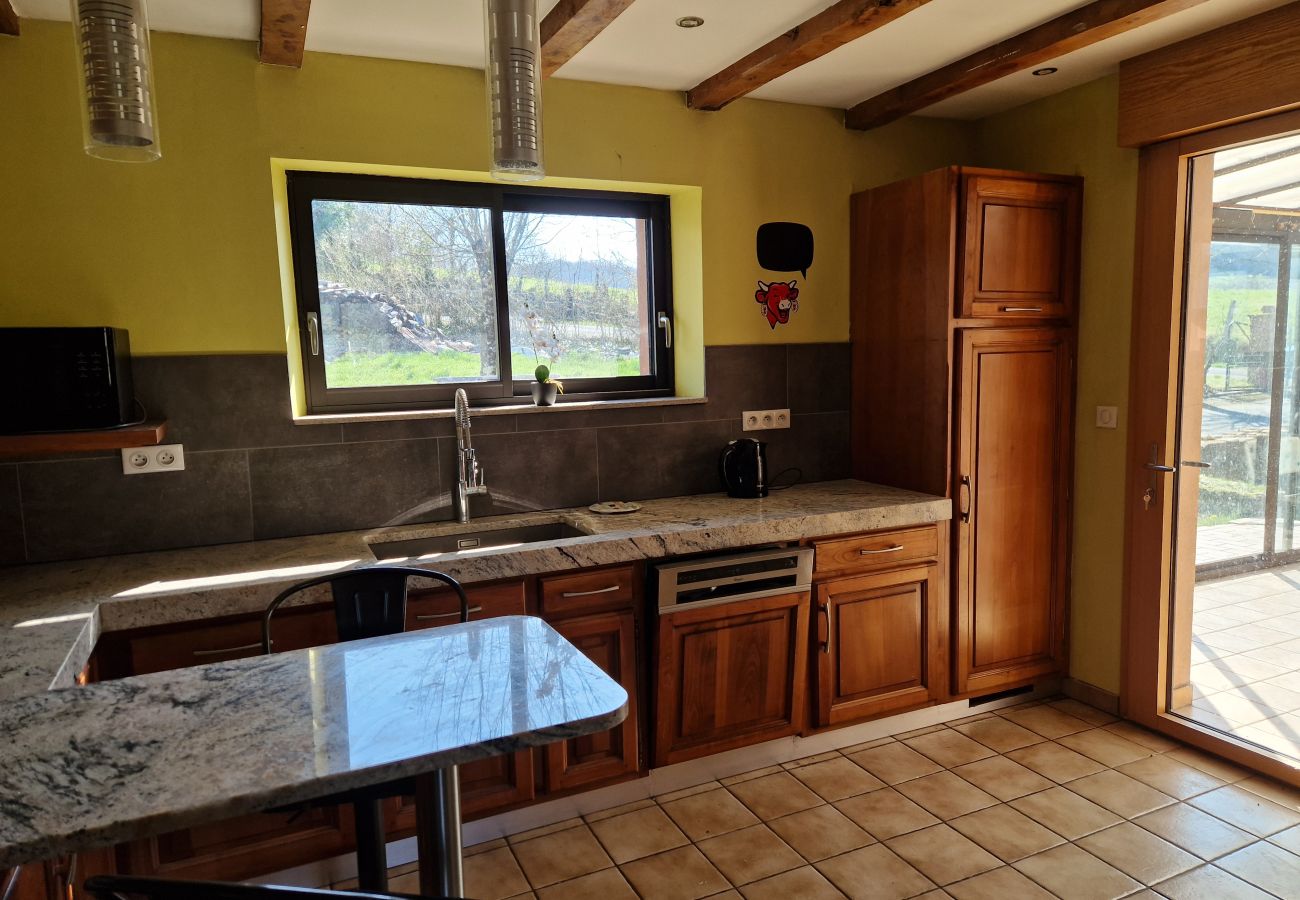 Gîte Rural à Sébrazac - L'Oustal de la Rusque